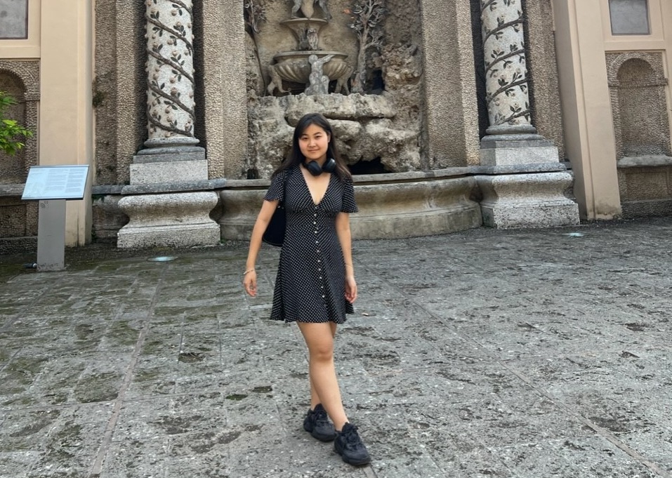 Yalguun Sarantuya poses in front of a fountain in Rome